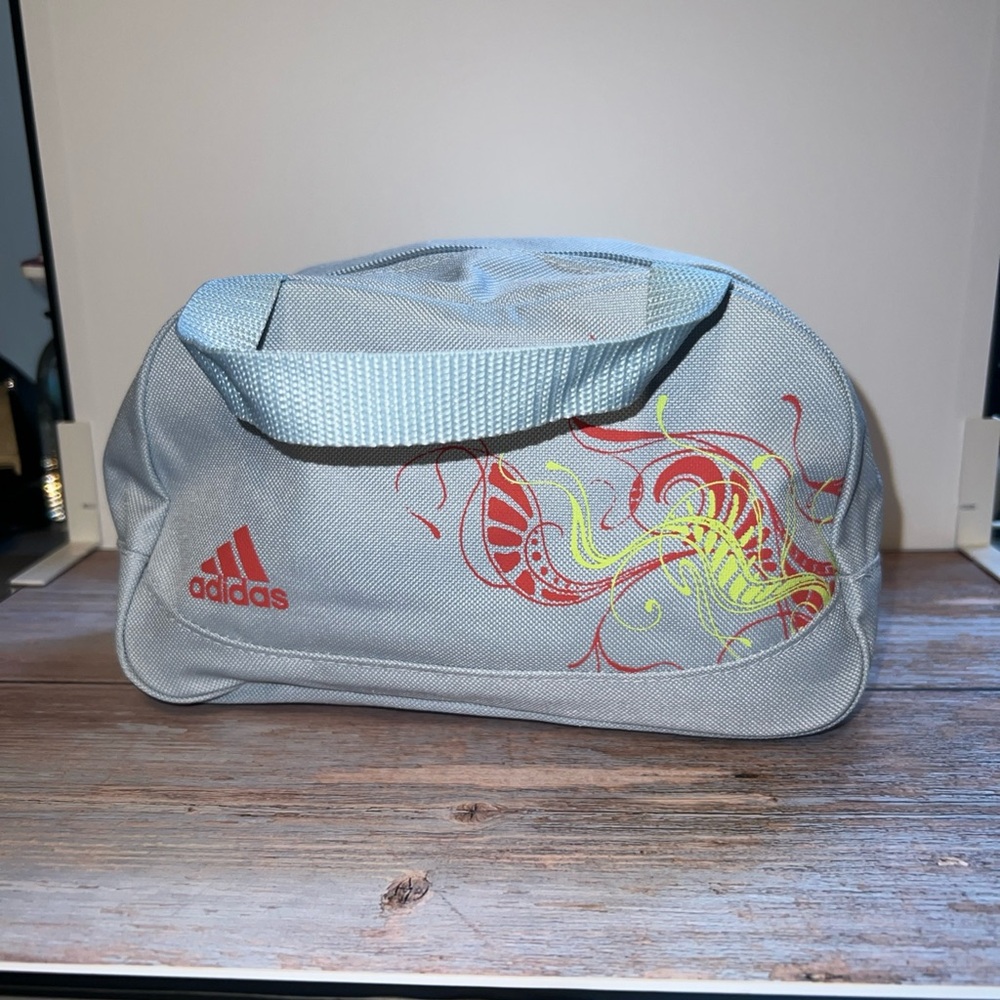 Adidas Gray Toiletry Bag with Red Logo and Yellow Design